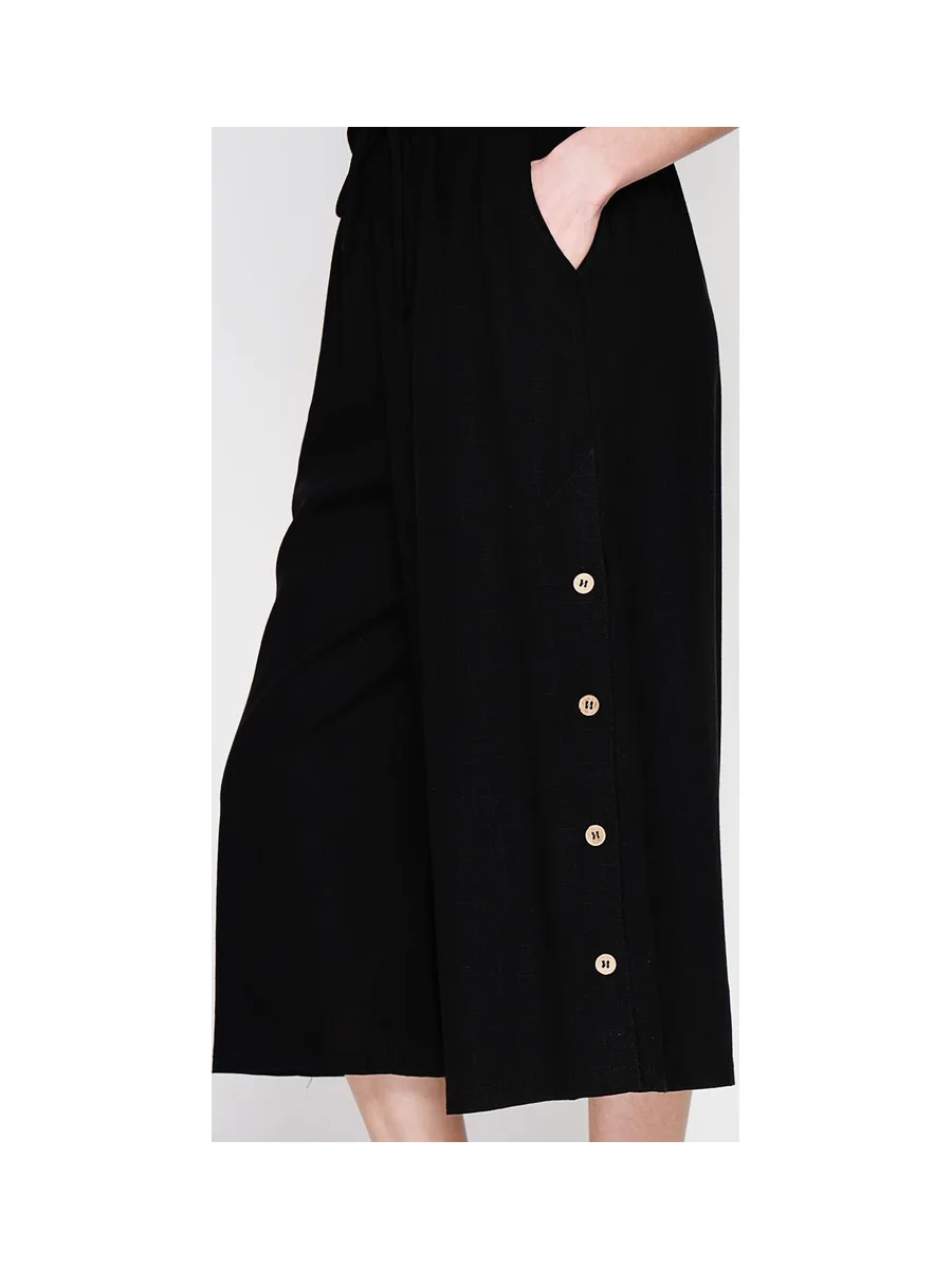 Pantalon coupe jupe poches latérale boutonne sur les cotes 9