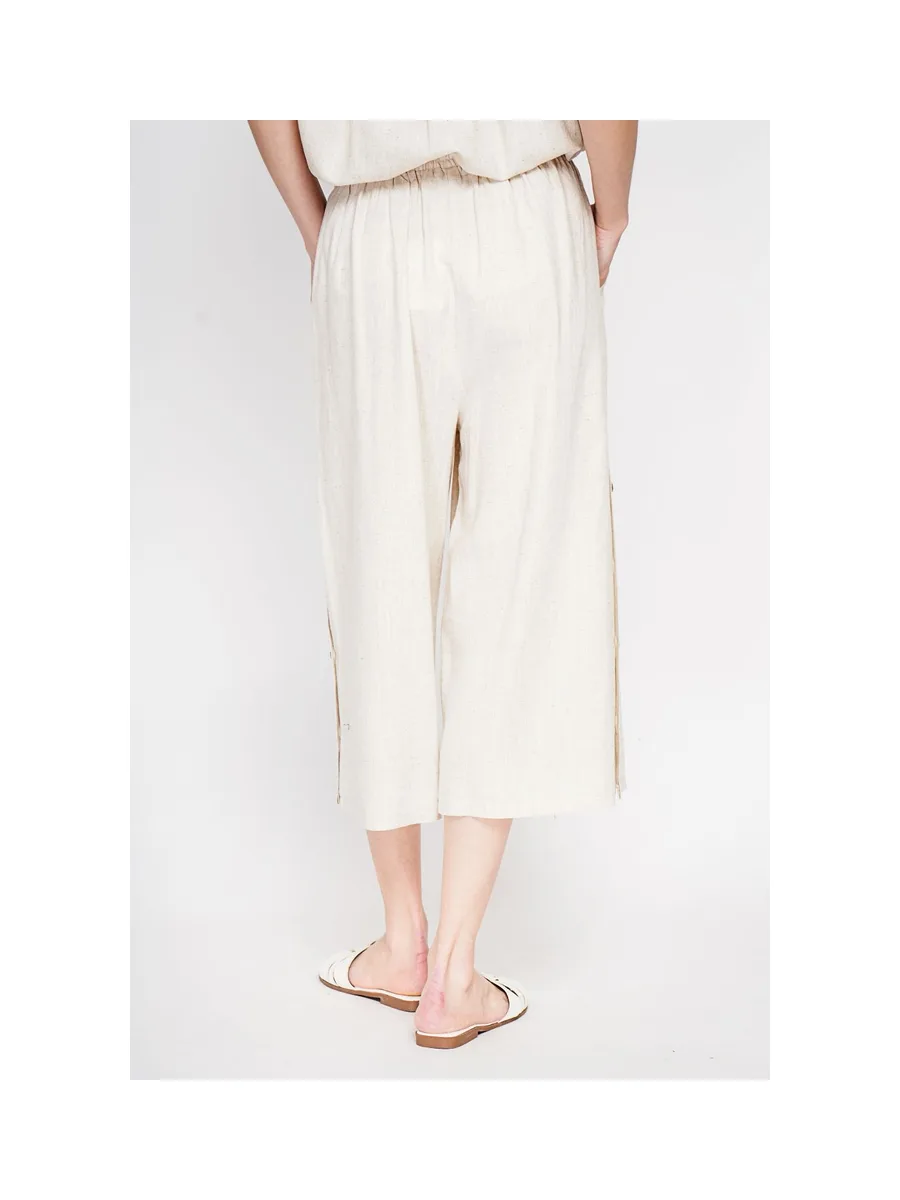 Pantalon coupe jupe poches latérale boutonne sur les cotes 6