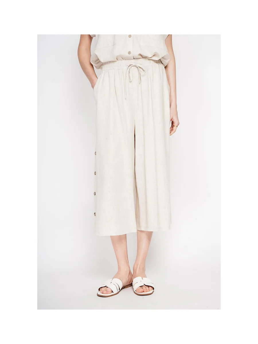 Pantalon coupe jupe poches latérale boutonne sur les cotes 7