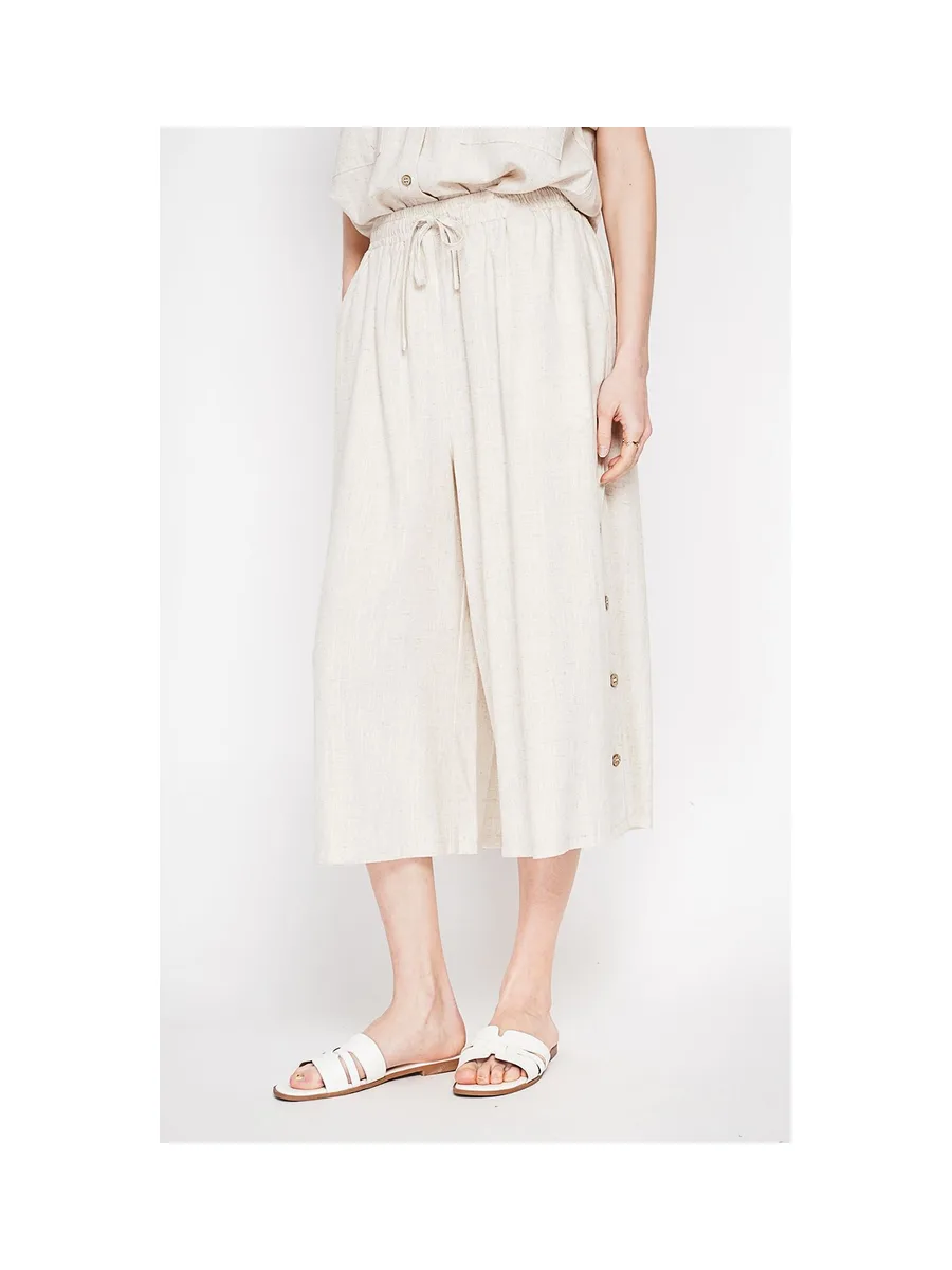 Pantalon coupe jupe poches latérale boutonne sur les cotes 8