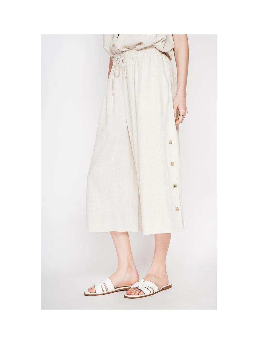 Pantalon coupe jupe poches latérale boutonne sur les cotes 5